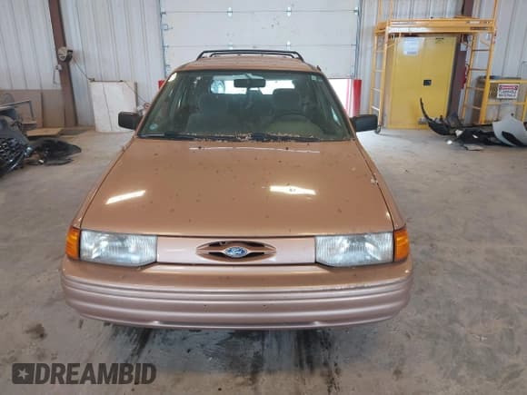 ✅ 1994 Ford Escort • VIN: 1FARP15J3RW212935 • Lot: 42595461. Listed on IAAI with 90,056 mi. Free auction sales archive from the USA and detailed vehicle history report at DreamBid. Image 6.
