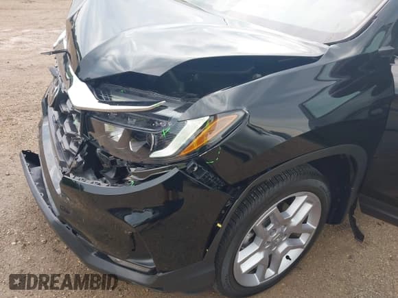 ✅ 2024 Honda Passport EX-L • VIN: 5FNYF8H59RB019595 • Lot: 42696453. Listed on IAAI with 18,292 mi. Free auction sales archive from the USA and detailed vehicle history report at DreamBid. Image 19.