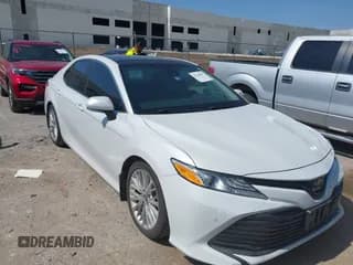 ✅ 2018 Toyota Camry LE • VIN: 4T1B11HK1JU674519 • Lot: 42746997. Listed on IAAI with 67,493 mi. Free auction sales archive from the USA and detailed vehicle history report at DreamBid. Image 1.