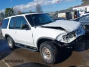 ✅ 1999 Ford Explorer Sport • VIN: 1FMYU22X2XUA33545 • Lot: 41818348. Wystawiony na IAAI z przebiegiem 130 848 mil. Bezpłatny archiwum sprzedaży aukcyjnych z USA i szczegółowy raport historii pojazdu na DreamBid. Zdjęcie 14.