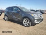 ✅ 2019 Ford Escape Titanium • VIN: 1FMCU0J99KUA91761 • Лот: 51874095. Опубликован ранее на Copart с пробегом 98 211 миль. Бесплатный доступ к архиву аукционных продаж из США и подробный отчёт об истории автомобиля на DreamBid. Изображение 4.