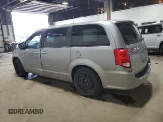 ✅ 2015 Dodge Grand Caravan American Value • VIN: 2C4RDGBG5FR682211 • Лот: 89443485. Опубликован ранее на Copart с пробегом 144 922 миль. Бесплатный доступ к архиву аукционных продаж из США и подробный отчёт об истории автомобиля на DreamBid. Изображение 2.
