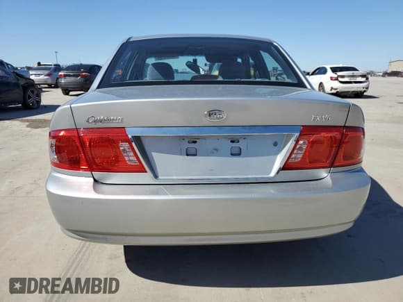 ✅ 2005 Kia Optima LX • VIN: KNAGD128055433689 • Лот: 46909305. Опубликован ранее на Copart с пробегом 27 609 миль. Бесплатный доступ к архиву аукционных продаж из США и подробный отчёт об истории автомобиля на DreamBid. Изображение 6.