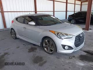 2014 Hyundai Veloster Turbo с VIN KMHTC6AE1EU182840, выставлен на аукционе IAAI как лот 43023906 с пробегом 56 788 миль миль и . История ставок и продаж доступна на DreamBid. Изображение 1.