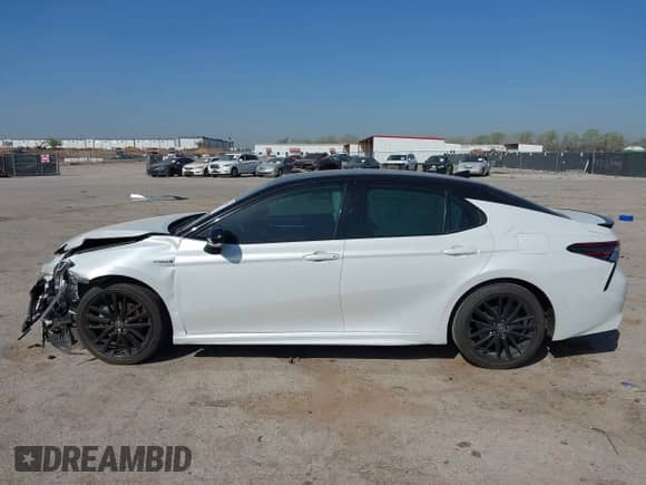 2021 Toyota Camry Hybrid XSE with VIN 4T1K31AK9MU025740, listed as a IAAI auction lot 41858877 with 54,140 mi miles and . Bid and sale history available at DreamBid. Image 14.