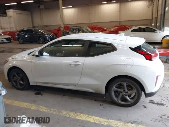 2019 Hyundai Veloster Premium with VIN KMHTG6AF7KU019571, listed as a IAAI auction lot 41478431 with 107,197 mi miles and . Bid and sale history available at DreamBid. Image 15.
