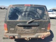 ✅ 2000 Jeep Cherokee • VIN: 1J4FF48S6YL166145 • Lot: 85129215. Wystawiony na Copart z przebiegiem 186 626 mil. Bezpłatny archiwum sprzedaży aukcyjnych z USA i szczegółowy raport historii pojazdu na DreamBid. Zdjęcie 6.