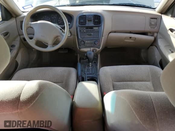 ✅ 2002 Kia Optima LX • VIN: KNAGD126X25156415 • Lot: 80253444. Listed on Copart with 104,775 mi. Free auction sales archive from the USA and detailed vehicle history report at DreamBid. Image 8.