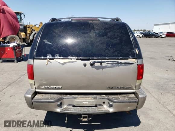 2002 Chevrolet Blazer LS z VIN 1GNDT13W22K190722, wystawiony jako Copart lot #68576164 z przebiegiem 124 420 mil mil oraz Szkoda całkowita • Salvage title. Historia ofert i sprzedaży dostępna na DreamBid. Obrazek 6.