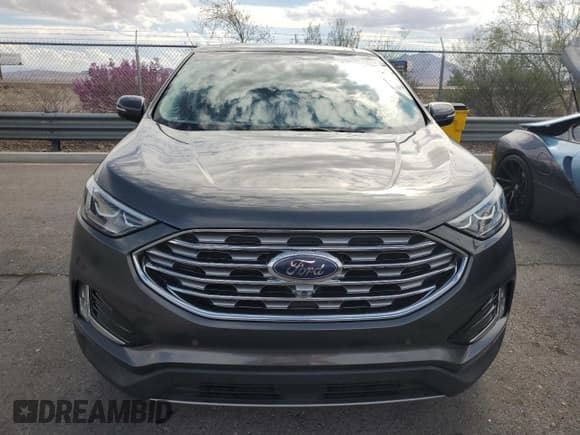✅ 2019 Ford Edge Titanium • VIN: 2FMPK3K98KBB42907 • Lot: 86265785. Wystawiony na Copart z przebiegiem 93 931 mil. Bezpłatny archiwum sprzedaży aukcyjnych z USA i szczegółowy raport historii pojazdu na DreamBid. Zdjęcie 5.