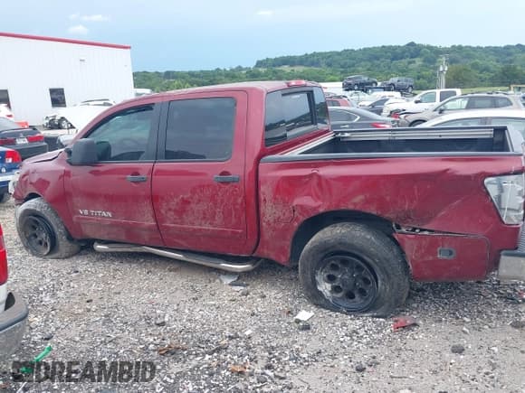 ✅ 2009 Nissan Titan SE • VIN: 1N6BA07D59N313413 • Lot: 42793004. Wystawiony na IAAI z przebiegiem 153 195 mil. Bezpłatny archiwum sprzedaży aukcyjnych z USA i szczegółowy raport historii pojazdu na DreamBid. Zdjęcie 15.