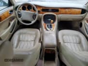 ✅ 1998 Jaguar XJ • VIN: SAJHX6243WC827873 • Lot: 78366904. Listed on Copart with Not provided. Free auction sales archive from the USA and detailed vehicle history report at DreamBid. Image 8.