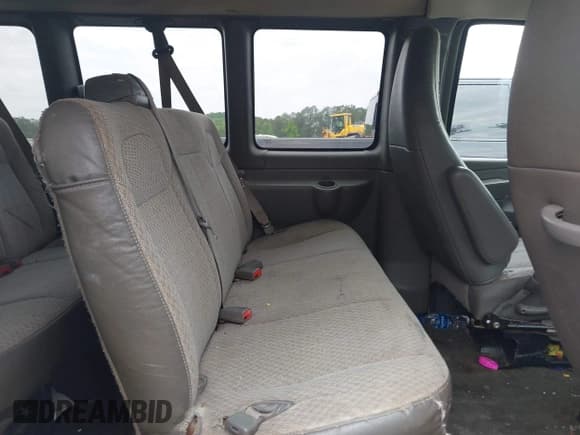 ✅ 2012 Chevrolet Express Passenger LS • VIN: 1GNSGBF4XC1143649 • Lot: 42259875. Listed on IAAI with 213,921 mi. Free auction sales archive from the USA and detailed vehicle history report at DreamBid. Image 8.