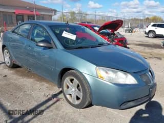 ✅ 2009 Pontiac G6 1SA • VIN: 1G2ZG57B794154450 • Lot: 43587032. Wystawiony na IAAI z przebiegiem 181 945 mil. Bezpłatny archiwum sprzedaży aukcyjnych z USA i szczegółowy raport historii pojazdu na DreamBid. Zdjęcie 1.
