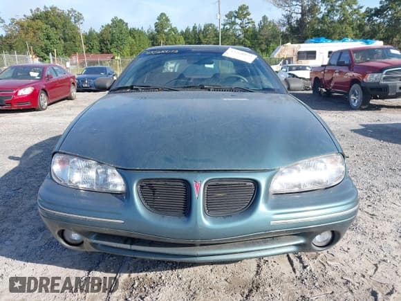 ✅ 1996 Pontiac Grand Am SE • VIN: 1G2NE52M7TC721718 • Lot: 43268073. Wystawiony na IAAI z przebiegiem 115 223 mil. Bezpłatny archiwum sprzedaży aukcyjnych z USA i szczegółowy raport historii pojazdu na DreamBid. Zdjęcie 6.
