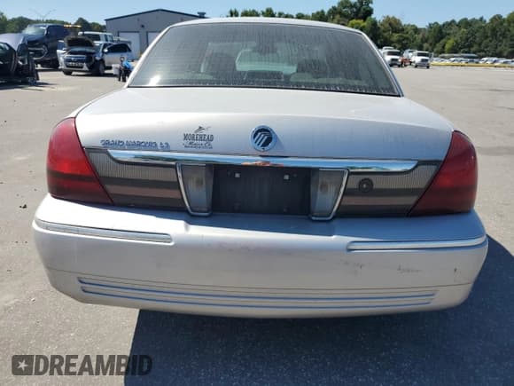 ✅ 2007 Mercury Grand Marquis LS • VIN: 2MEFM75V87X611545 • Lot: 70330965. Wystawiony na Copart z przebiegiem 119 910 mil. Bezpłatny archiwum sprzedaży aukcyjnych z USA i szczegółowy raport historii pojazdu na DreamBid. Zdjęcie 6.