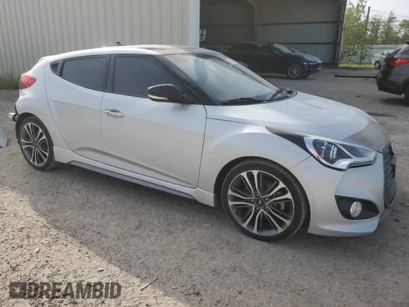 ✅ 2017 Hyundai Veloster Turbo • VIN: KMHTC6AE2HU310054 • Лот: 63442184. Размещён на Copart с пробегом 103 960 миль миль. Получите бесплатный доступ к архиву аукционных продаж из США и посмотрите подробный отчёт об истории автомобиля на DreamBid. Изображение 4.