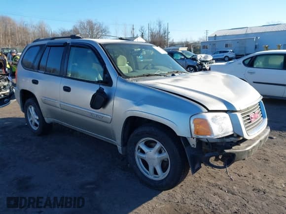 ✅ 2005 GMC Envoy SLE • VIN: 1GKDT13S452194933 • Lot: 41426512. Listed on IAAI with 176,897 mi. Free auction sales archive from the USA and detailed vehicle history report at DreamBid. Image 1.