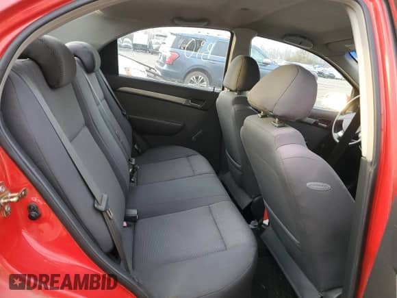 2007 Chevrolet Aveo LS z VIN KL1TD566X7B074736, wystawiony jako Copart lot #83889764 z przebiegiem 119 923 mil mil oraz Szkoda całkowita • Salvage title. Historia ofert i sprzedaży dostępna na DreamBid. Obrazek 10.