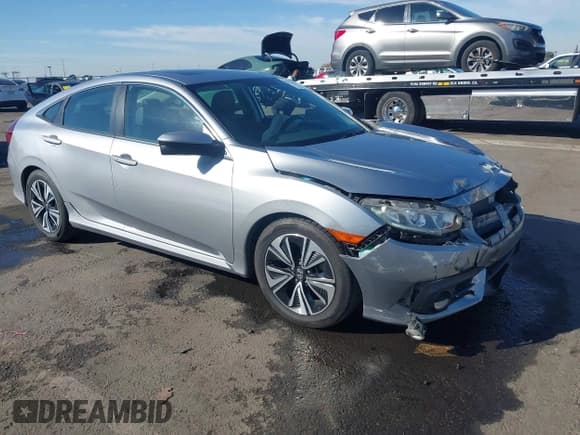 ✅ 2017 Honda Civic EX-L • VIN: 19XFC1F78HE207105 • Lot: 43604365. Listed on IAAI with 118,969 mi. Free auction sales archive from the USA and detailed vehicle history report at DreamBid. Image 1.