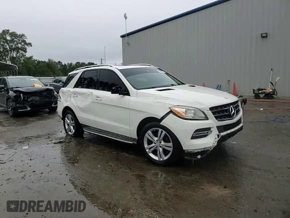 ✅ 2013 Mercedes-Benz M 350 • VIN: 4JGDA5JB4DA156288 • Lot: 89868265. Listed on Copart with 121,797 mi. Free auction sales archive from the USA and detailed vehicle history report at DreamBid. Image 14.