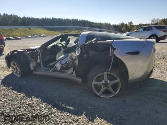 2005 Chevrolet Corvette with VIN 1G1YY24U055111302, listed as a Copart auction lot 76705084 with Not provided miles and Salvage title. Bid and sale history available at DreamBid. Image 2.
