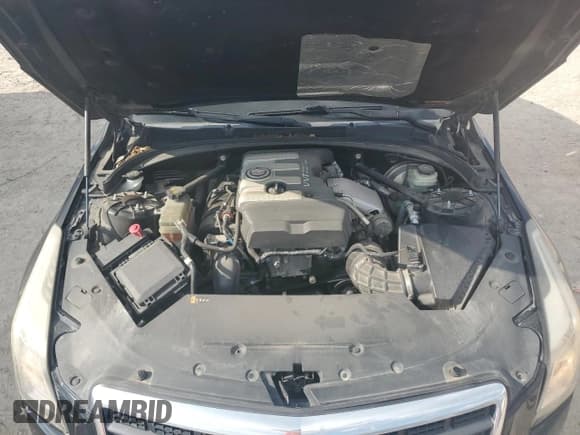 ✅ 2014 Cadillac ATS Standard AWD • VIN: 1G6AG5RX7E0194291 • Лот: 68959425. Опубликован ранее на Copart с пробегом 122 331 миль. Бесплатный доступ к архиву аукционных продаж из США и подробный отчёт об истории автомобиля на DreamBid. Изображение 11.