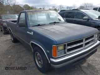 1988 Dodge Dakota z VIN 1B7GN14X7JS782283, wystawiony jako IAAI lot #41717137 z przebiegiem 104 582 mil mil oraz . Historia ofert i sprzedaży dostępna na DreamBid. Obrazek 1.