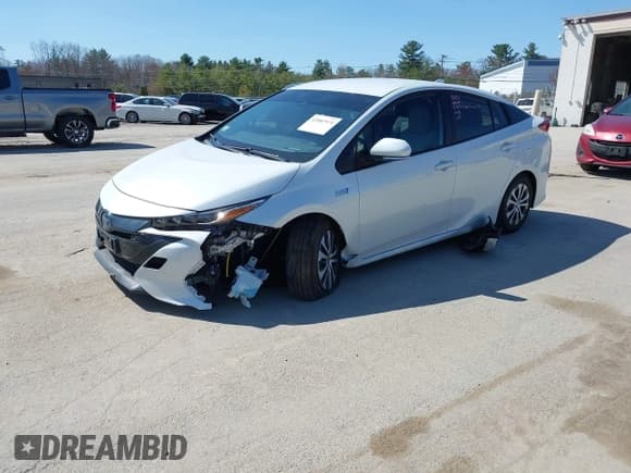 ✅ 2021 Toyota Prius LE • VIN: JTDKAMFP8M3174629 • Lot: 42087974. Listed on IAAI with 16,348 mi. Free auction sales archive from the USA and detailed vehicle history report at DreamBid. Image 2.