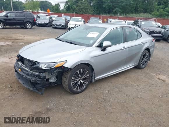 2020 Toyota Camry SE with VIN 4T1G11BKXLU009460, listed as a IAAI auction lot 42907075 with 43,495 mi miles and . Bid and sale history available at DreamBid. Image 18.