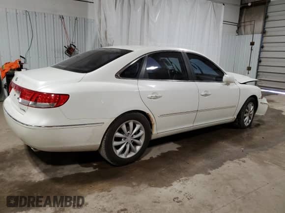 2006 Hyundai Azera SE с VIN KMHFC46F96A136033, выставлен на аукционе Copart как лот 53430715 с пробегом Не указан миль и Списание • Salvage title. История ставок и продаж доступна на DreamBid. Изображение 3.