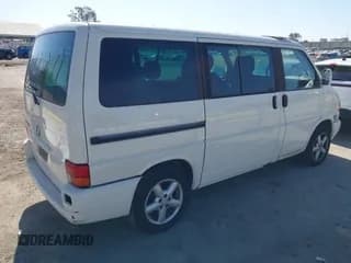 ✅ 2002 Volkswagen EuroVan GLS • VIN: WV2KB47042H047408 • Лот: 42007062. Опубликован ранее на IAAI с пробегом 131 971 миль. Бесплатный доступ к архиву аукционных продаж из США и подробный отчёт об истории автомобиля на DreamBid. Изображение 4.