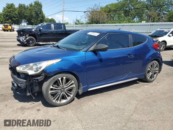 2016 Hyundai Veloster Turbo z VIN KMHTC6AE7GU276000, wystawiony jako Copart lot #69335545 z przebiegiem 106 188 mil mil oraz Czysty tytuł • Clean title. Historia ofert i sprzedaży dostępna na DreamBid. Obrazek 1.