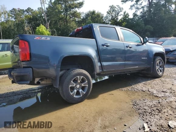 ✅ 2020 Chevrolet Colorado 2WD Z71 • VIN: 1GCGSDEN4L1135341 • Лот: 68313164. Опубликован ранее на Copart с пробегом 57 079 миль. Бесплатный доступ к архиву аукционных продаж из США и подробный отчёт об истории автомобиля на DreamBid. Изображение 3.