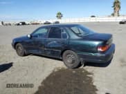 ✅ 1995 Toyota Camry LE • VIN: JT2GK12E3S0117364 • Lot: 65818255. Wystawiony na Copart z przebiegiem 215 464 mil. Bezpłatny archiwum sprzedaży aukcyjnych z USA i szczegółowy raport historii pojazdu na DreamBid. Zdjęcie 2.