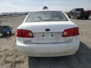 ✅ 2006 Kia Optima LX • VIN: KNAGE123865056094 • Lot: 68669744. Wystawiony na Copart z przebiegiem 194 894 mil. Bezpłatny archiwum sprzedaży aukcyjnych z USA i szczegółowy raport historii pojazdu na DreamBid. Zdjęcie 6.