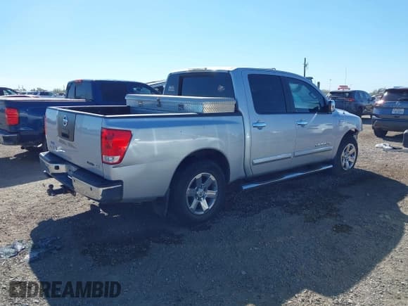 ✅ 2012 Nissan Titan SV • VIN: 1N6BA0ED5CN303510 • Лот: 43665825. Опубликован ранее на IAAI с пробегом 239 702 миль. Бесплатный доступ к архиву аукционных продаж из США и подробный отчёт об истории автомобиля на DreamBid. Изображение 4.