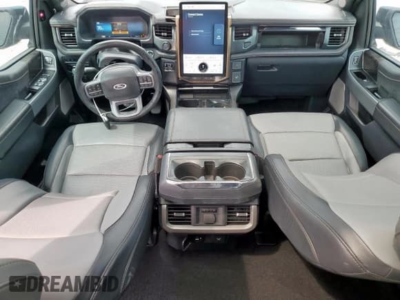 ✅ 2023 Ford F-150 Lightning XLT • VIN: 1FT6W1EV5PWG34849 • Лот: 69879315. Опубликован ранее на Copart с пробегом 34 468 миль. Бесплатный доступ к архиву аукционных продаж из США и подробный отчёт об истории автомобиля на DreamBid. Изображение 8.