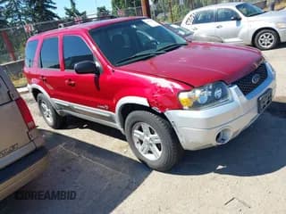 ✅ 2006 Ford Escape Hybrid • VIN: 1FMYU96H16KB36736 • Lot: 42972317. Listed on IAAI with 136,194 mi. Free auction sales archive from the USA and detailed vehicle history report at DreamBid. Image 1.