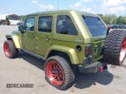 ✅ 2007 Jeep Wrangler Unlimited Sahara • VIN: 1J4GA59117L118162 • Lot: 42835652. Listed on IAAI with 199,208 mi. Free auction sales archive from the USA and detailed vehicle history report at DreamBid. Image 3.