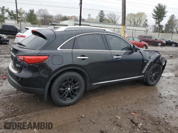 ✅ 2014 Infiniti QX70 • VIN: JN8CS1MWXEM412233 • Lot: 52859325. Listed on Copart with 109,121 mi. Free auction sales archive from the USA and detailed vehicle history report at DreamBid. Image 3.