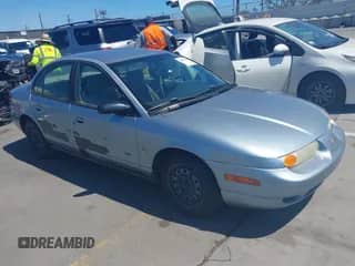 2002 Saturn SL с VIN 1G8ZK54772Z133207, выставлен на аукционе IAAI как лот 42820413 с пробегом 70 906 миль миль и . История ставок и продаж доступна на DreamBid. Изображение 1.