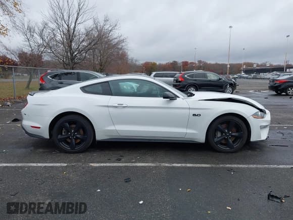 ✅ 2022 Ford Mustang GT • VIN: 1FA6P8CF6N5140218 • Lot: 43650751. Listed on IAAI with 28,781 mi. Free auction sales archive from the USA and detailed vehicle history report at DreamBid. Image 13.