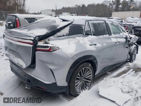 ✅ 2023 Lexus RZ 450e Premium • VIN: JTJAAAAB2PA014698 • Lot: 41515071. Listed on IAAI with 19,335 mi. Free auction sales archive from the USA and detailed vehicle history report at DreamBid. Image 4.