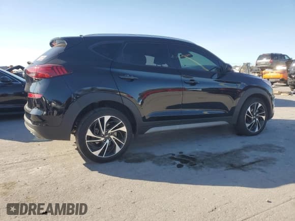 ✅ 2021 Hyundai Tucson Sport • VIN: KM8J33AL2MU282920 • Lot: 82742045. Listed on Copart with 69,409 mi. Free auction sales archive from the USA and detailed vehicle history report at DreamBid. Image 3.