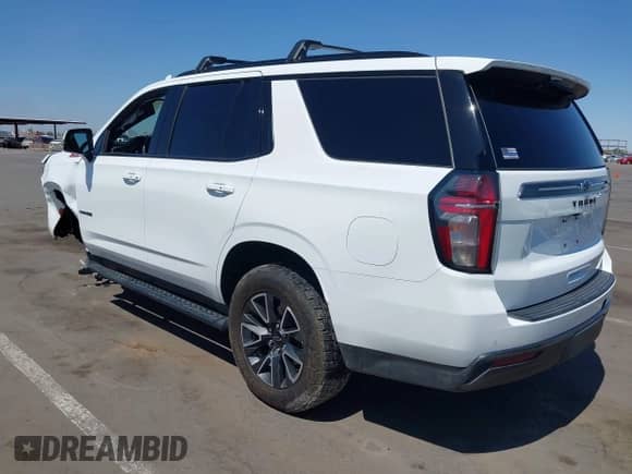 2022 Chevrolet Tahoe Z71 z VIN 1GNSKPKD1NR158062, wystawiony jako IAAI lot #42576884 z przebiegiem 51 083 mil mil oraz . Historia ofert i sprzedaży dostępna na DreamBid. Obrazek 3.