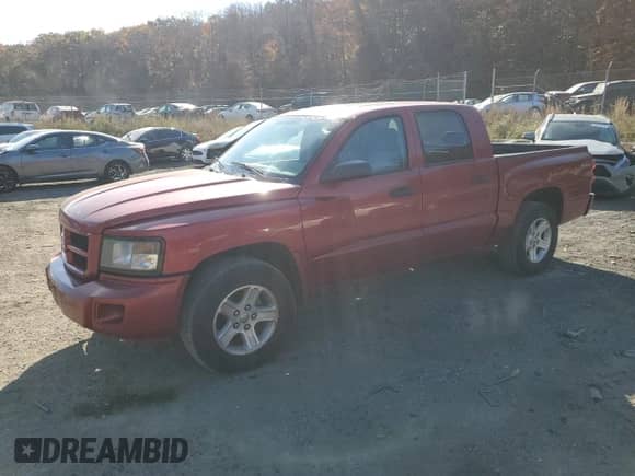 2010 Dodge Dakota Bighorn/Lonestar с VIN 1D7CW3GK1AS234924, выставлен на аукционе Copart как лот 79342704 с пробегом 98 057 миль миль и Чистый • Clean title. История ставок и продаж доступна на DreamBid. Изображение 1.