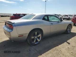 2014 Dodge Challenger SXT z VIN 2C3CDYAG0EH139872, wystawiony jako Copart lot #68122374 z przebiegiem 113 207 mil mil oraz Szkoda całkowita • Salvage title. Historia ofert i sprzedaży dostępna na DreamBid. Obrazek 3.