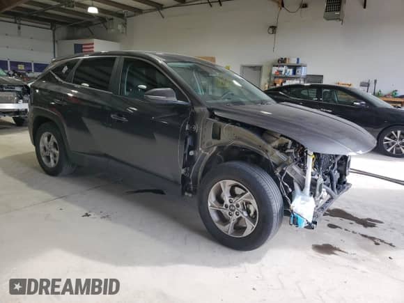 2022 Hyundai Tucson SE with VIN 5NMJA3AE5NH052759, listed as a Copart auction lot 90626665 with 58,295 mi miles and Salvage title. Bid and sale history available at DreamBid. Image 4.