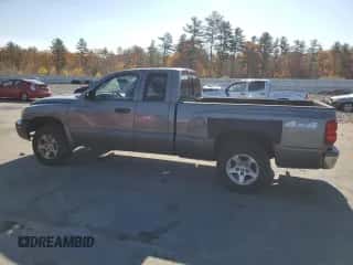 2005 Dodge Dakota SLT с VIN 1D7HW42K35S220807, выставлен на аукционе Copart как лот 77024824 с пробегом 118 053 миль миль и Чистый • Clean title. История ставок и продаж доступна на DreamBid. Изображение 2.